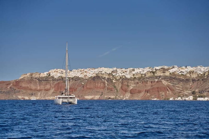 Santorini: Caldera Classic Catamaran Cruise w/ Meal & Drinks - Wind, seasickness, and practical limits