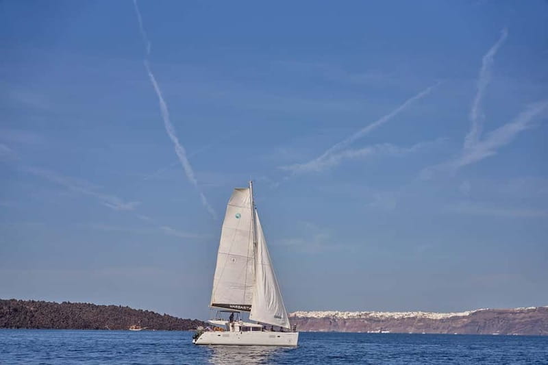 Santorini: Caldera Classic Catamaran Cruise w/ Meal & Drinks - Swimming at Mesa Pigadia