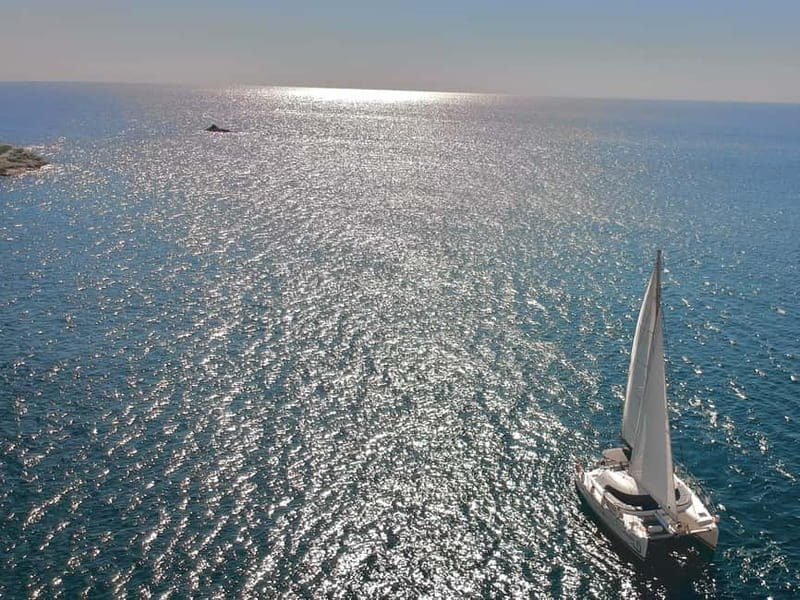 Santorini: Catamaran Cruise with Food and Drinks - Day cruise or sunset cruise?