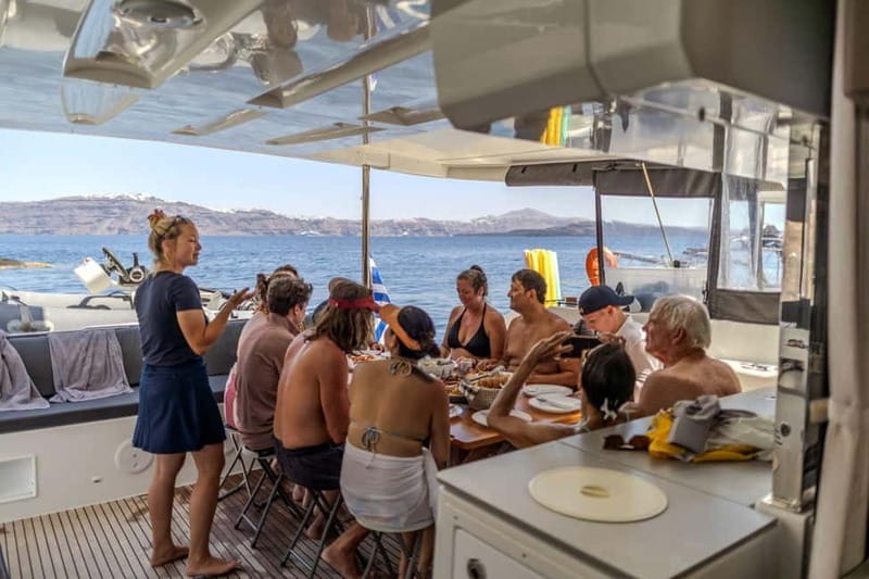 Santorini: Catamaran Cruise with Fresh Meal & Open Bar - Swimming near Black Mountain and Akrotiri Lighthouse