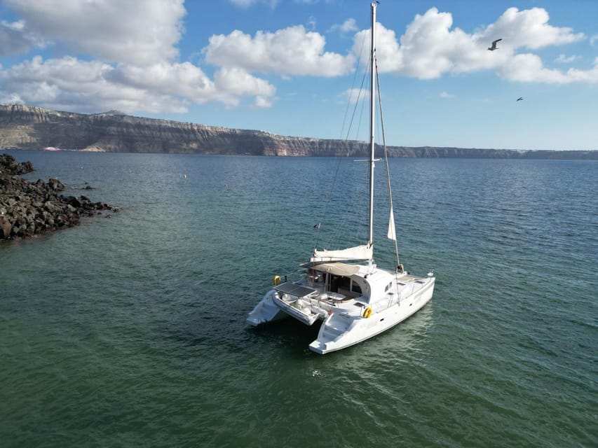 Santorini: Catamaran Cruise with Greek BBQ and Drinks - Mesa Pigadia for a final swim