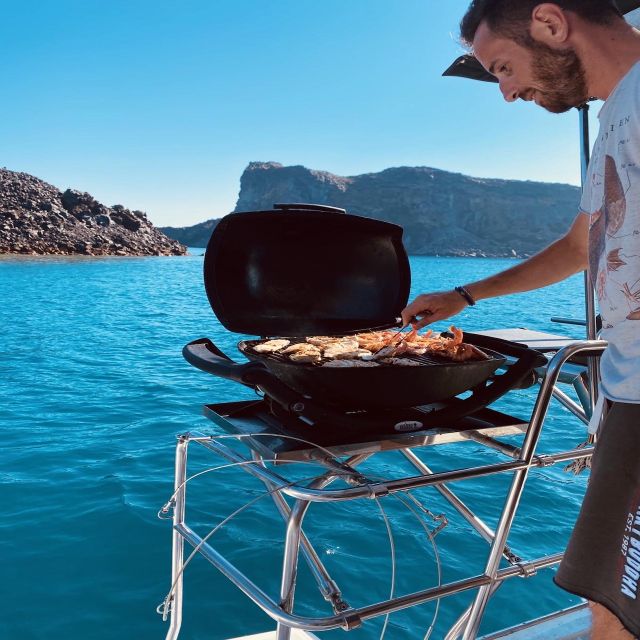 Santorini: Catamaran Cruise with Lunch, Drinks, & Oia Visit - Palea Kameni and the volcanic hot springs