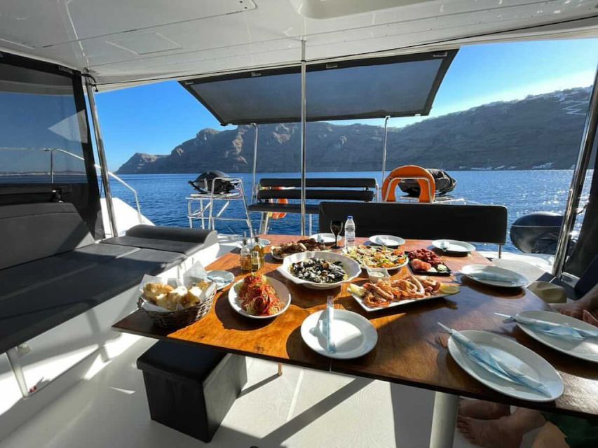 Santorini: Catamaran Cruise with Meal & Open Bar - Key points at a glance