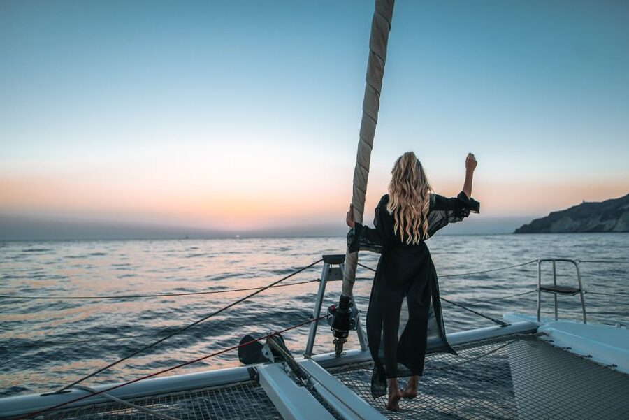 Santorini: Catamaran Cruise with Meal & Open Bar - Swimming at Mesa Pigadia and the volcanic coast