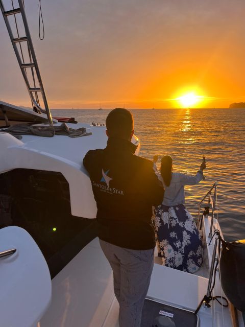 Santorini Catamaran Cruise with Swimming, Meal and Open Bar - From Thera or Oia to Vlychada Marina