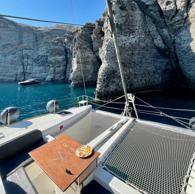 Santorini Catamaran Cruise with Swimming, Meal and Open Bar - Group size, comfort, and the pace