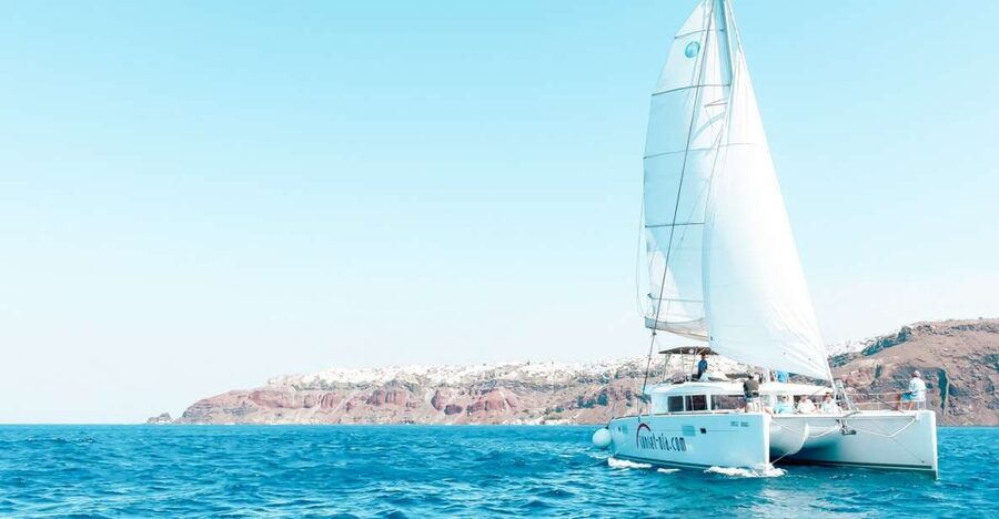 Santorini: Catamaran Tour with BBQ Meal and Unlimited Drinks - The hot springs near Nea Kameni