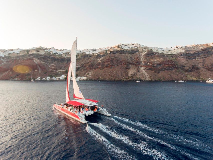 Santorini: Cruise Catamaran with BBQ & Drinks Day or Sunset - Morning or sunset: which departure should you choose?