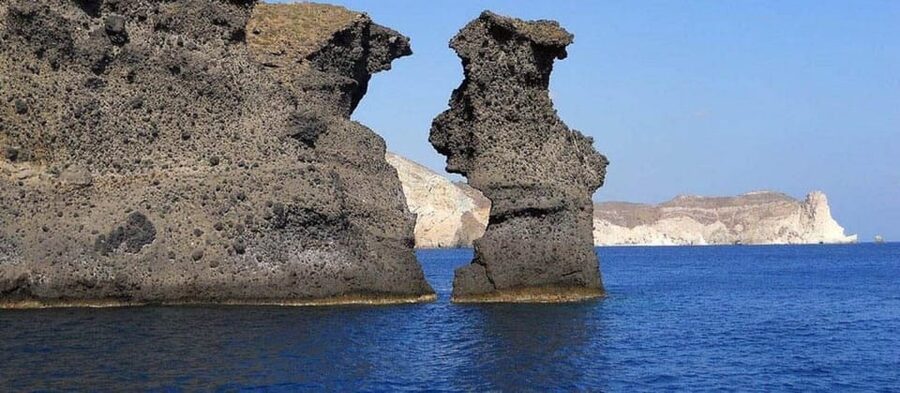 Santorini:Cruises with Catamaran around the Volcanic Island. - Red Beach and Santorini’s volcanic colors