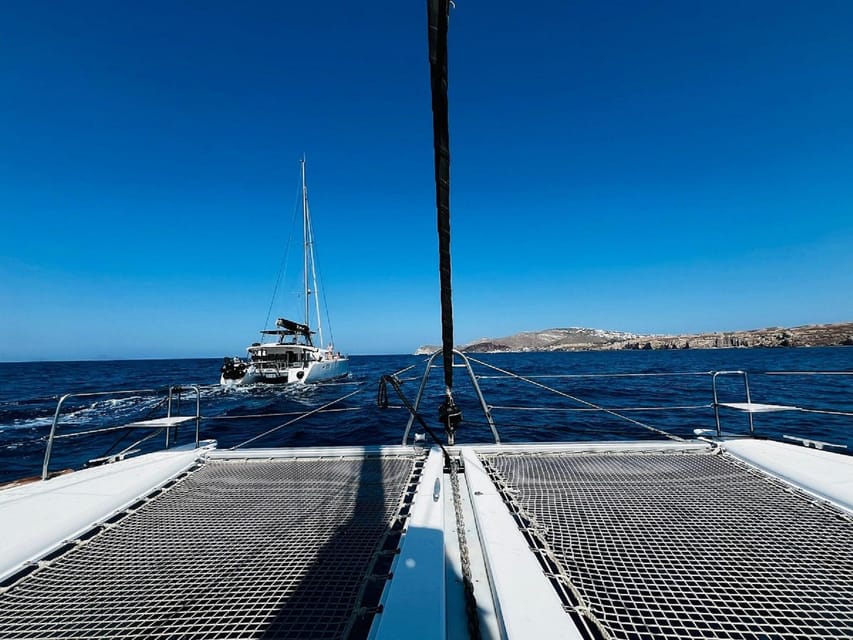 Santorini:Cruises with Catamaran around the Volcanic Island. - The volcanic thermal springs between the Kameni islands
