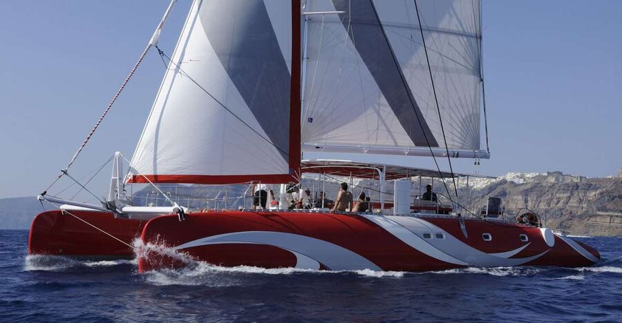 Santorini: Dream Catcher 5-hour Sailing Trip in the Caldera - Entering the Caldera under the Indian Head Mountain