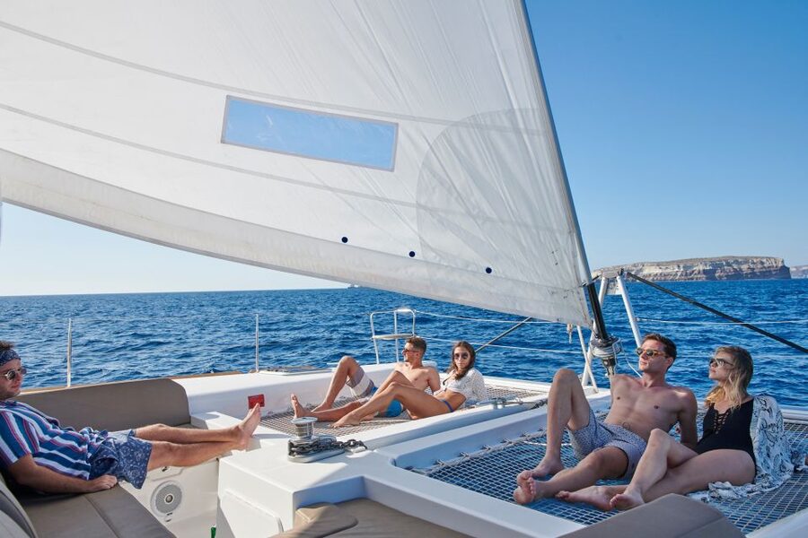 Santorini Gold Catamaran Cruise with Snorkel, BBQ & Open Bar - Open drinks, comfort, and the five-hour pace