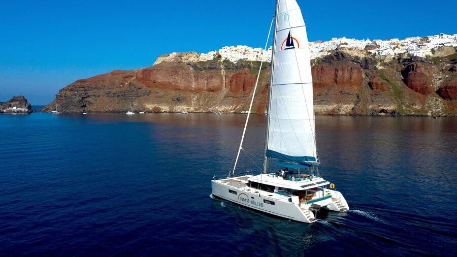 Santorini: Luxurious Catamaran Cruise with Meal & Open Bar - Red Beach and its volcanic colors