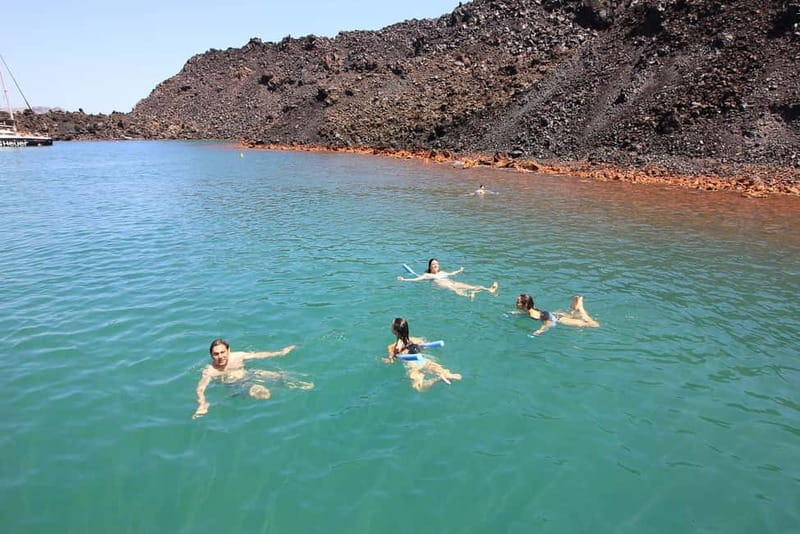 Santorini: Luxury Catamaran Cruise with Lunch, BBQ & Drinks - Thirasia combines a swim with lunch