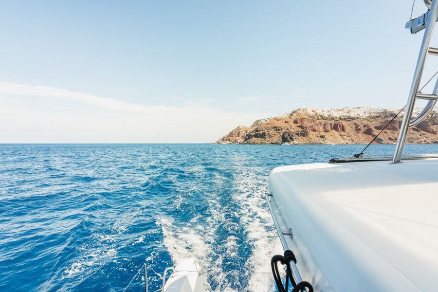 Santorini: Luxury Catamaran Day Trip with Meal and Open Bar - The Greek meal and open bar