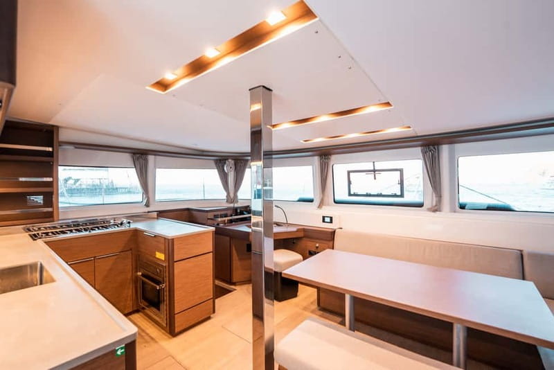 Santorini: Majestic Catamaran Cruise with Meal and Drinks - Greek food, BBQ, and drinks on board