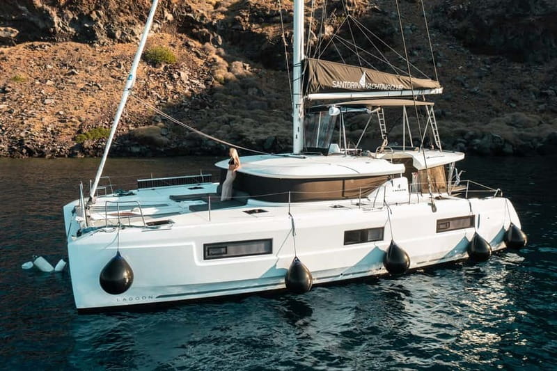 Santorini: Majestic Catamaran Cruise with Meal and Drinks - Choosing the day cruise or sunset cruise
