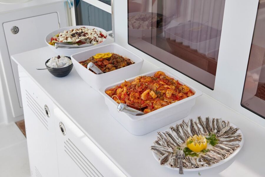Santorini: Platinum Catamaran Cruise w/ BBQ Meal & Open Bar - Pickup from your hotel to Vlychada