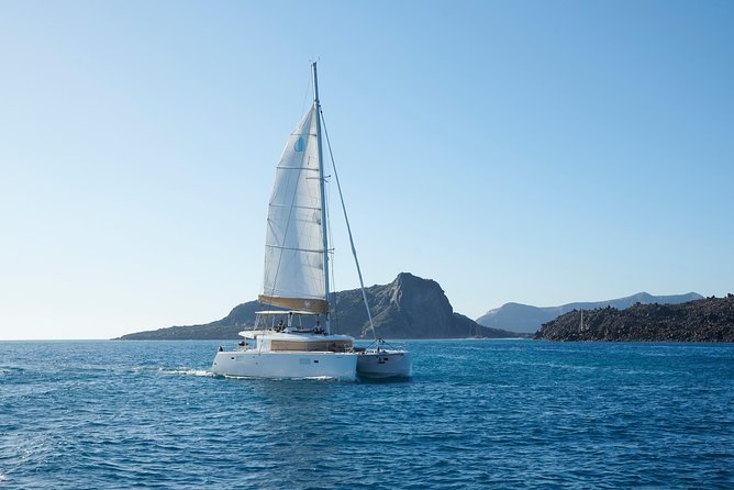 Santorini Platinum Catamaran Cruise with Meal, BBQ and Open Bar - Thirassia combines swimming and lunch