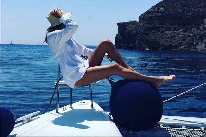 Santorini Platinum Catamaran Cruise with Meal, BBQ and Open Bar - Sunset, music, and the mood onboard