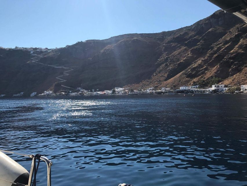 Santorini: Private 5-Hour Sunset Sailing Tour with Dinner - What the crew adds to the experience