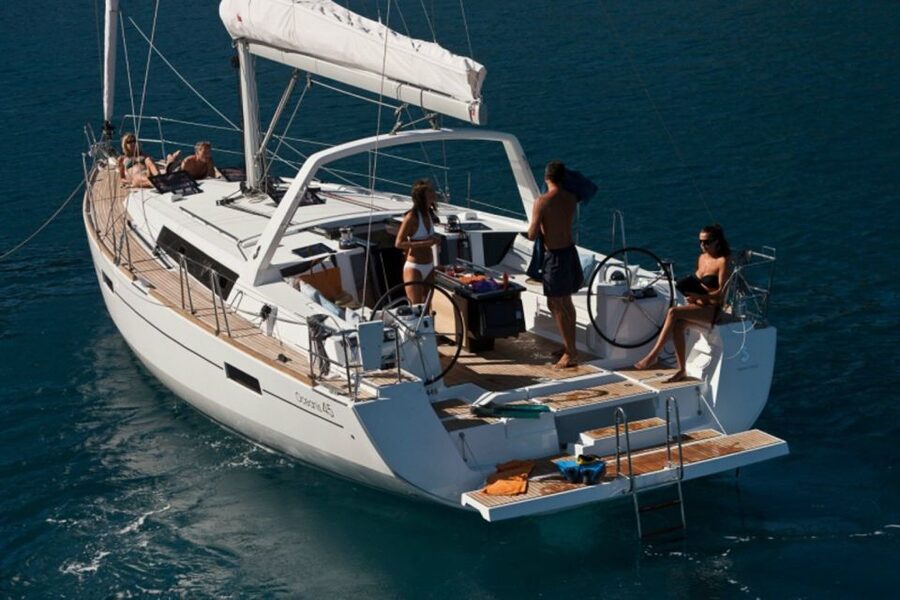 Santorini: Private Caldera Sailing Trip with Open Bar & Meal - Red Beach and the volcanic south coast