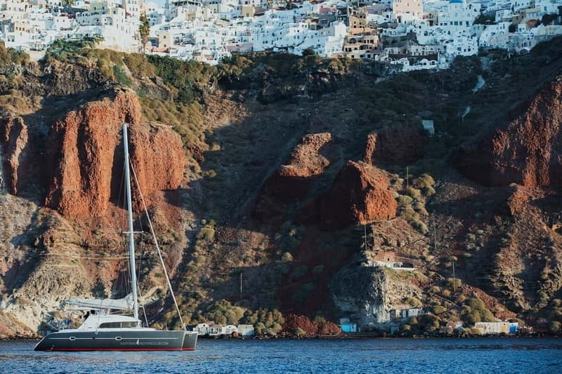 Santorini: Private Catamaran Cruise with BBQ Meal and Drinks - Why Santorini looks better from the sea