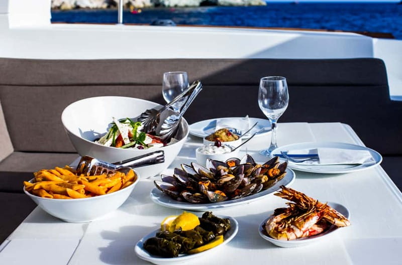 Santorini: Private Catamaran Cruise with BBQ Meal and Drinks - Sunset departures and daytime sailing