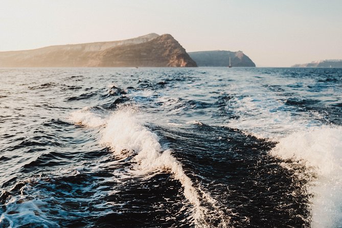 Santorini Private Catamaran Cruise with BBQ, Open Bar & Transfers - Indian Rocks and the cliffside villages