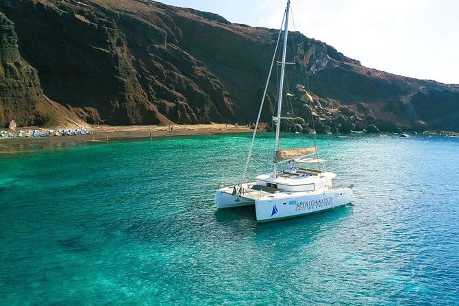 Santorini Private Catamaran Cruise with BBQ, Open Bar & Transfers - Day sailing or sunset cruise?