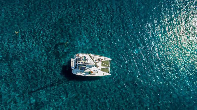 Santorini: Private Catamaran Cruise with Food & Drinks - Why seeing Santorini by boat changes the day