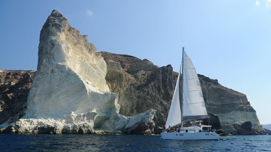 Santorini: Private Catamaran Tour with BBQ Meal and Drinks - Mesa Pigadia, caves, and the first swim