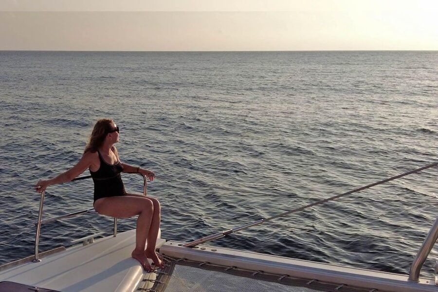 Santorini: Sunset Sailing Cruise, with Dinner and Drinks - Entering the caldera and swimming at Nea Kameni