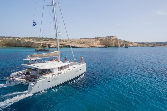 Shared Catamaran All inclusive-Day Cruise to Naxos or Paros - Swimming at quiet coves and island beaches
