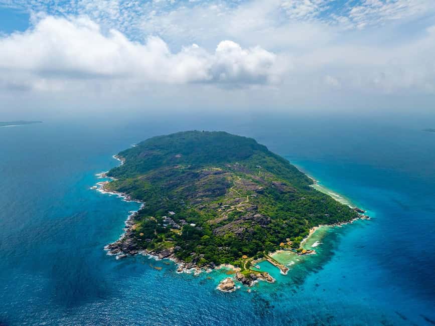 Sister, Coco, and Felicite Island: Seychelles Catamaran Tour - Sister Island brings the first big view
