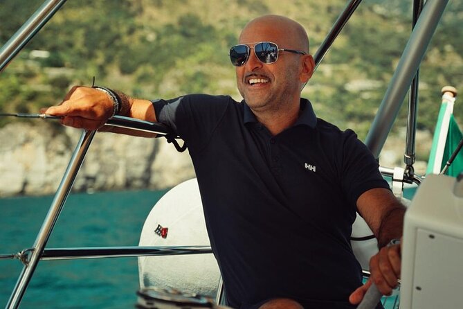 Small Group Sailing Tour in Amalfi Coast with Aperitif - Amalfi’s cliffs, natural arch, and old defense towers
