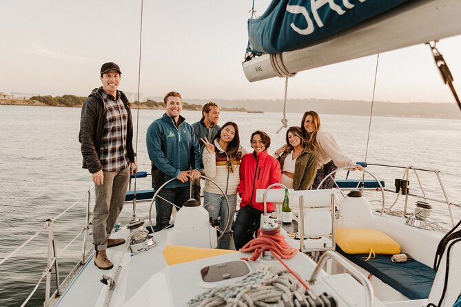 Small-Group San Diego Sunset Sailing Excursion - Passing the USS Midway and Coronado Bridge