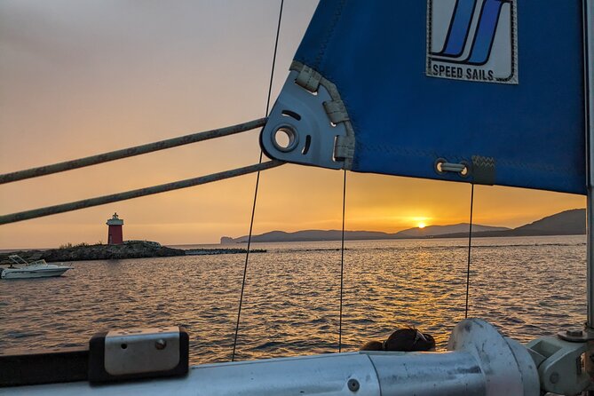 Sunset and Aperitif on a Sailing Boat in Alghero - Party boat or peaceful sunset cruise?