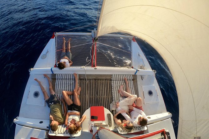 Sunset Cruise : Moorea Sailing on a Catamaran named Taboo - Sunset from the water, with a Mai Tai