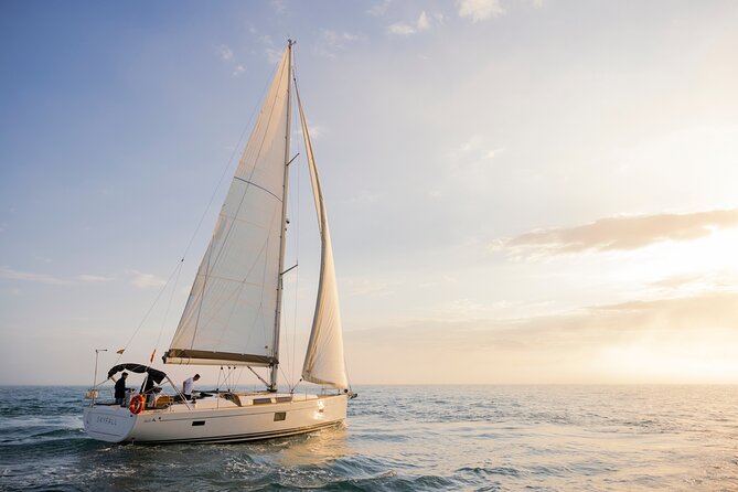 Sunset On A Luxury Sailboat From Port Olimpic - Port Olímpic and Port Vell from offshore