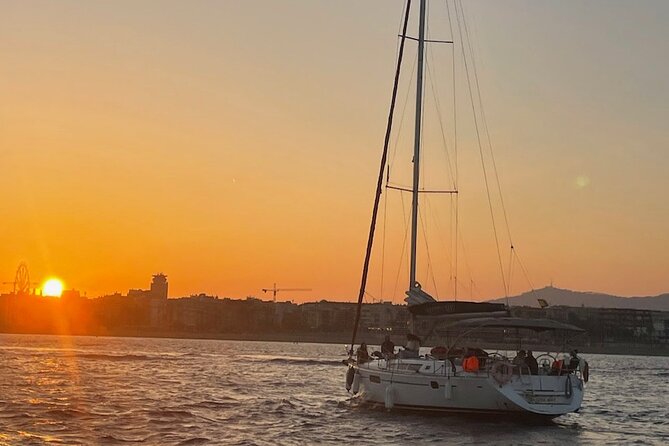 Sunset Sailboat Tour along the Coast with Open Bar - Leaving Port Olímpic as the light softens
