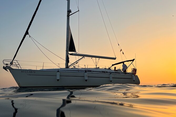 Sunset Sailing Cruise in Barcelona led by Young & Local Captain - A quiet alternative to a large party catamaran