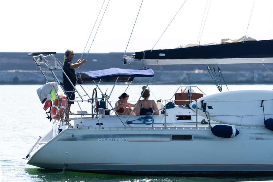 Taormina: Sailing boat tour with aperitif included - Leaving Giardini Naxos for the Taormina coast