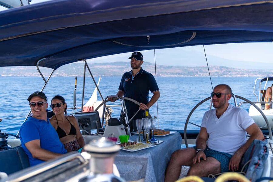 Taormina: Sailing boat tour with aperitif included - Mazzarò Bay from the water