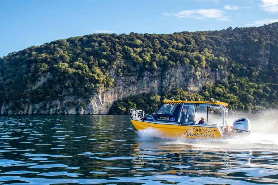 Taupo: Lake Taupo Western Bays Catamaran Tour with Bush Walk - Cliffs, rock faces, and the quieter Western Bays