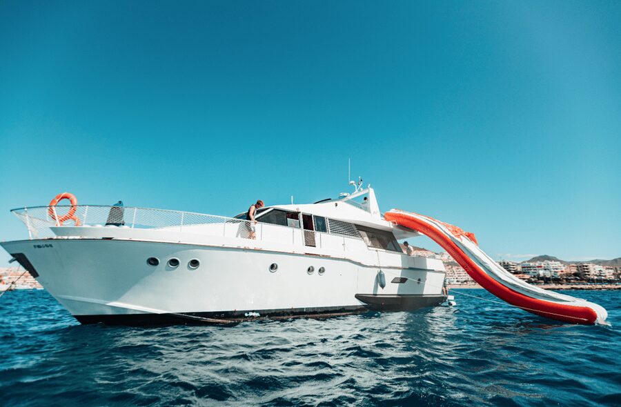 Tenerife: Fun Yacht Trip with Water Activities and Toys - The Los Cristianos stop is the heart of the experience