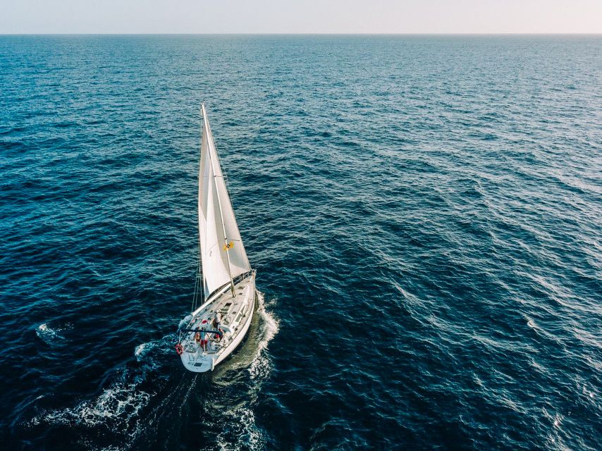 Tenerife: Sailboat Tour Whale Watching Food and Snorkeling - Sailing out along Tenerife’s south coast