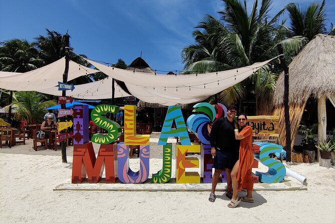 Top Isla Mujeres Catamaran Tour with Snorkel Open Bar and Buffet lunch - The return cruise and sunset views