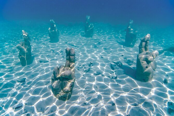 Top Isla Mujeres Catamaran Tour with Snorkel Open Bar and Buffet lunch - Transport from Cancun, Puerto Morelos, and Playa del Carmen
