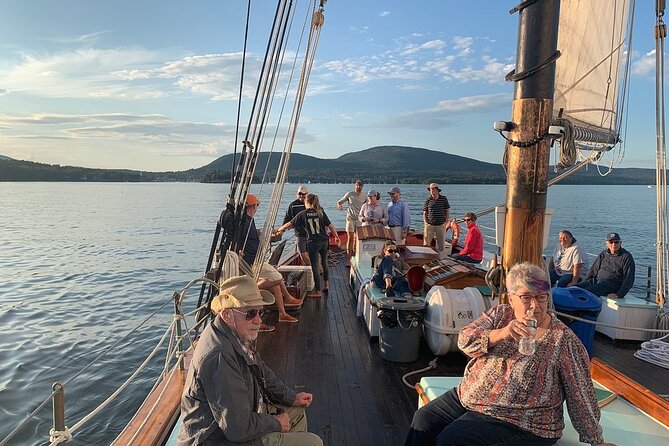 Windjammer Classic Sunset Sail from Camden, Maine - Raising the sails and taking the wheel